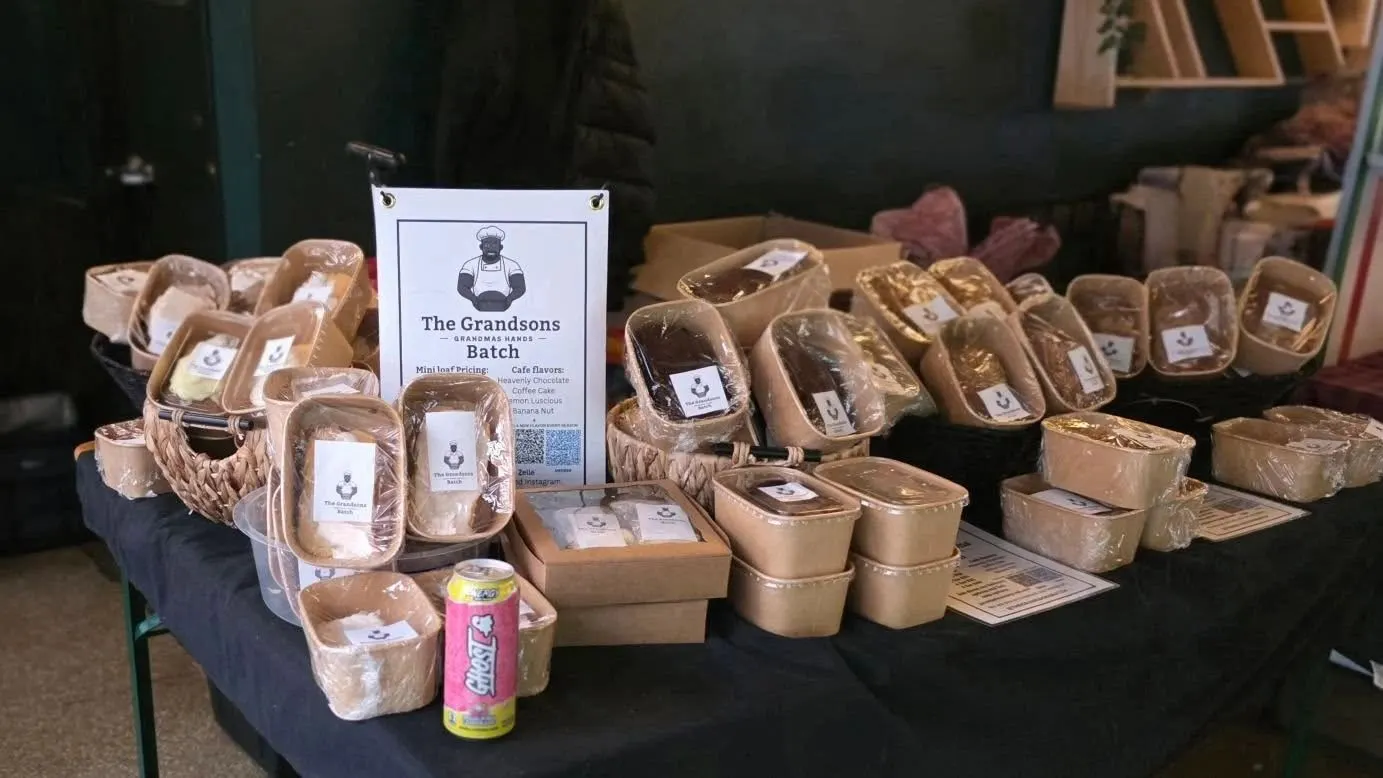 Grandsons Batch mini loaves and baked goods displayed at a local outdoor market