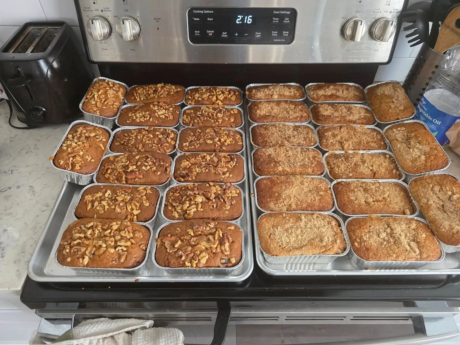 Rows of fresh mini loaves cooling after baking